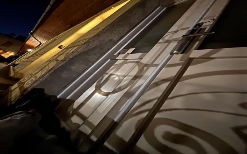 Spending the night at the door.