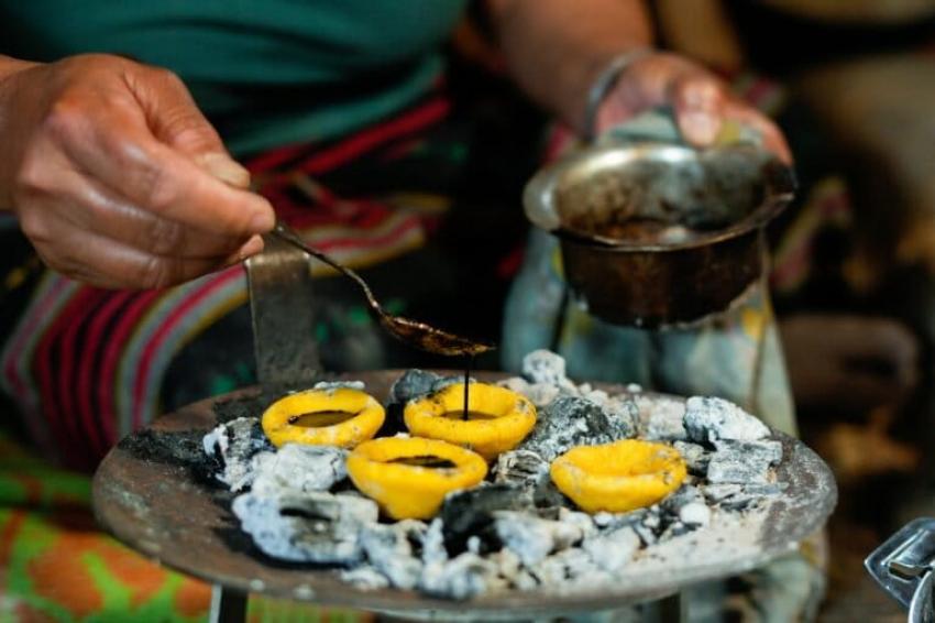 Phursing gombu, a corn tart with the oleoresins of the Chinese lacquer tree, gently roasted in yak ghee over smoldering charcoal, served at Damu’s Heritage Dine. Image by Surajit Sharma.