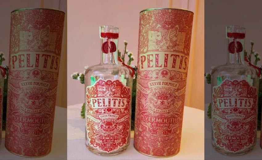 Peliti bottle. Federico Peliti was a confectioner, entrepreneur, sculptor and photographer from Northern Italy.