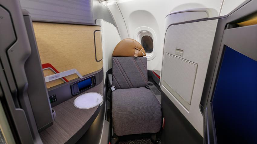 Flagship Suite seats feature lie-flat seating and direct aisle access. Photo: American Airlines website.
